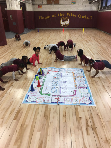 Students in gym playing Skillastics during After School Program