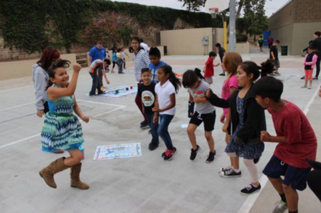 Student playing Skillastics in Outdoor After School Program