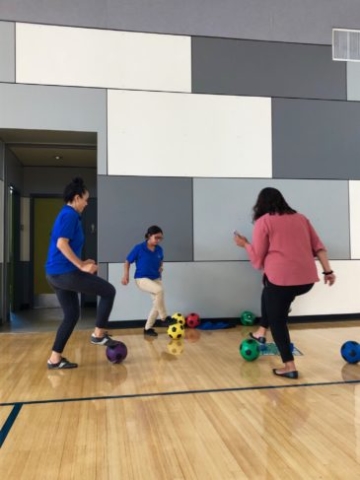 After School instructors practicing soccer during Professional Development Training.